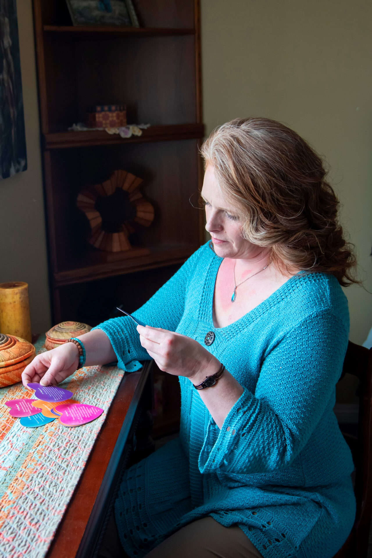 woman-meditating-with-tray-with-candles